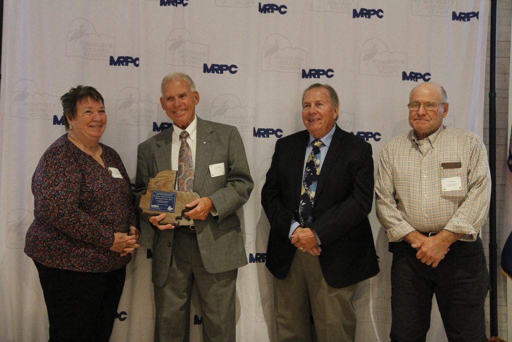 The Fraternal Order of Eagles – 4340 Aerie of Vienna was presented with an Outstanding Community Service Award by MRPC Board Chair Mary Heywood (left) and Vice Chair Darryl Griffin (second right) at the 2024 Annual Dinner and Awards Banquet on Oct. 24 in Linn. The Eagles were nominated by Maries County Presiding Commissioner Vic Stratman (right), who represents Belle. Tom Eads accepted the award on its behalf.